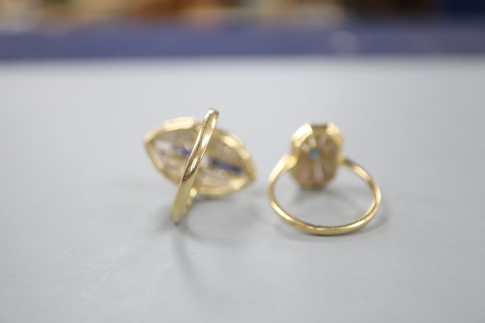 Two modern 18ct gold, sapphire and diamond set dress rings, (three stones missing from one), sizes M & O, gross 7.2 grams.
